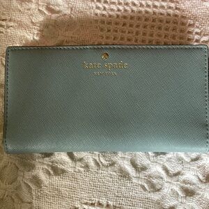 Kate Spade EUC Madison Slim Saffiano Leather  Bifold Wallet in Pale Blue.